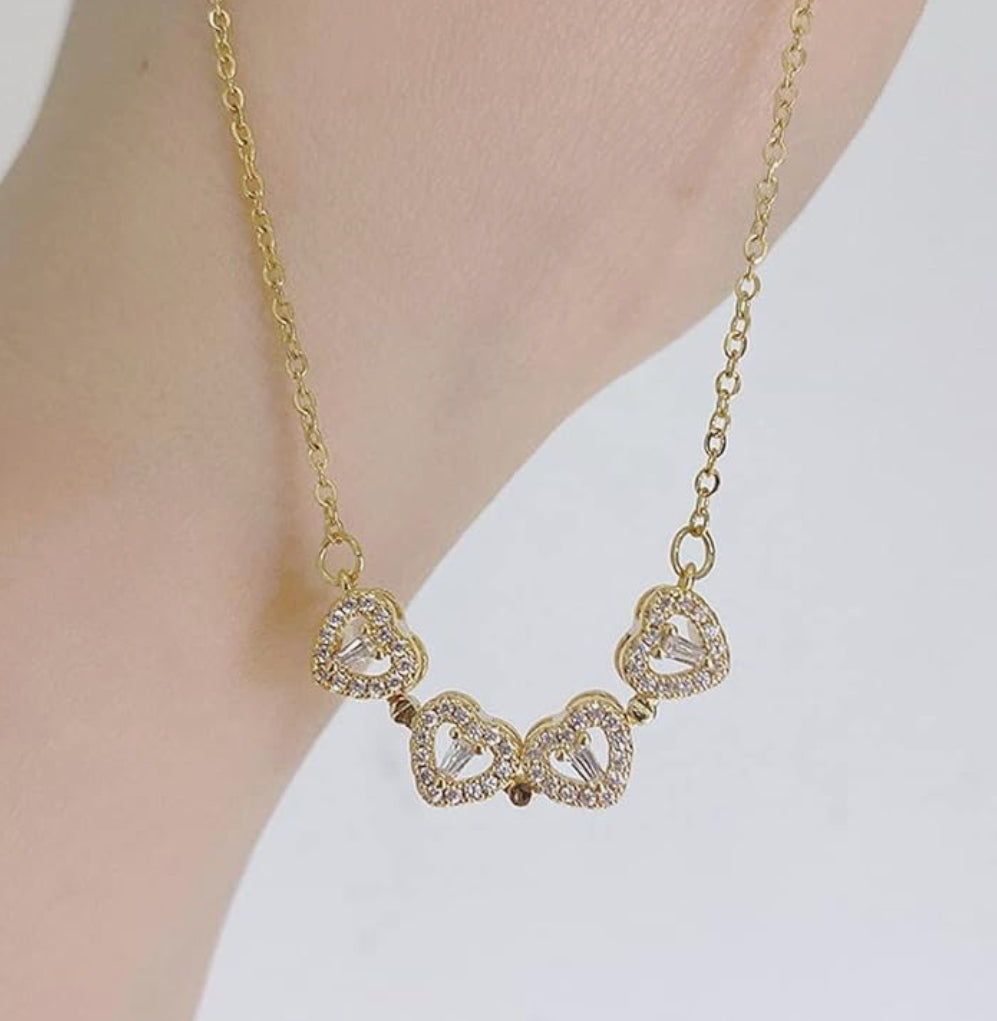 Collier trèfle à quatre cœur